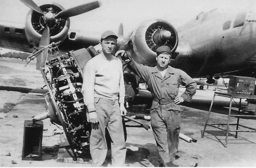 Frederick J. Lang and Colleague Repairing B-17 Engine - 601st Squadron - 1944